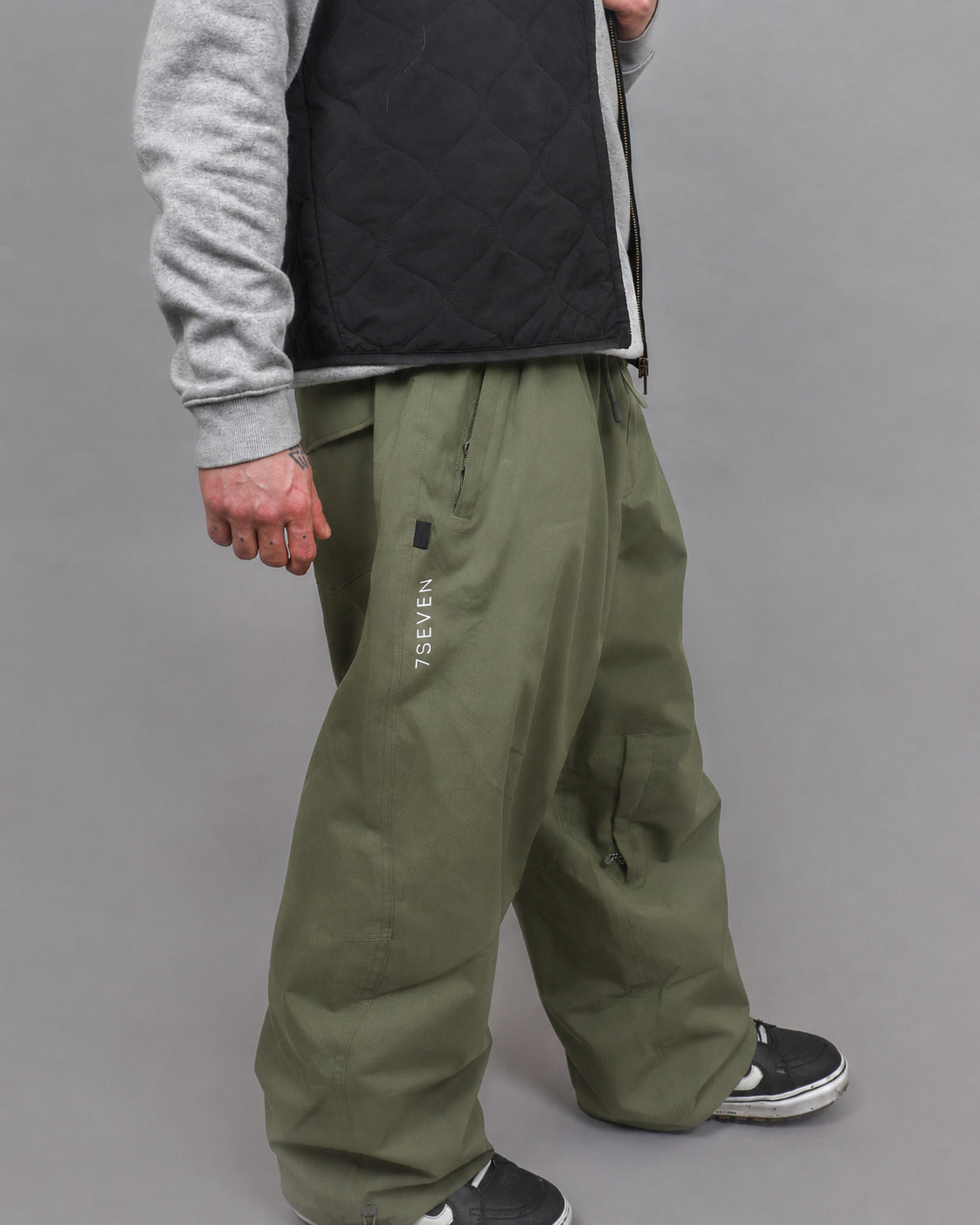 Olive Baggy Snow Pants, studio side view