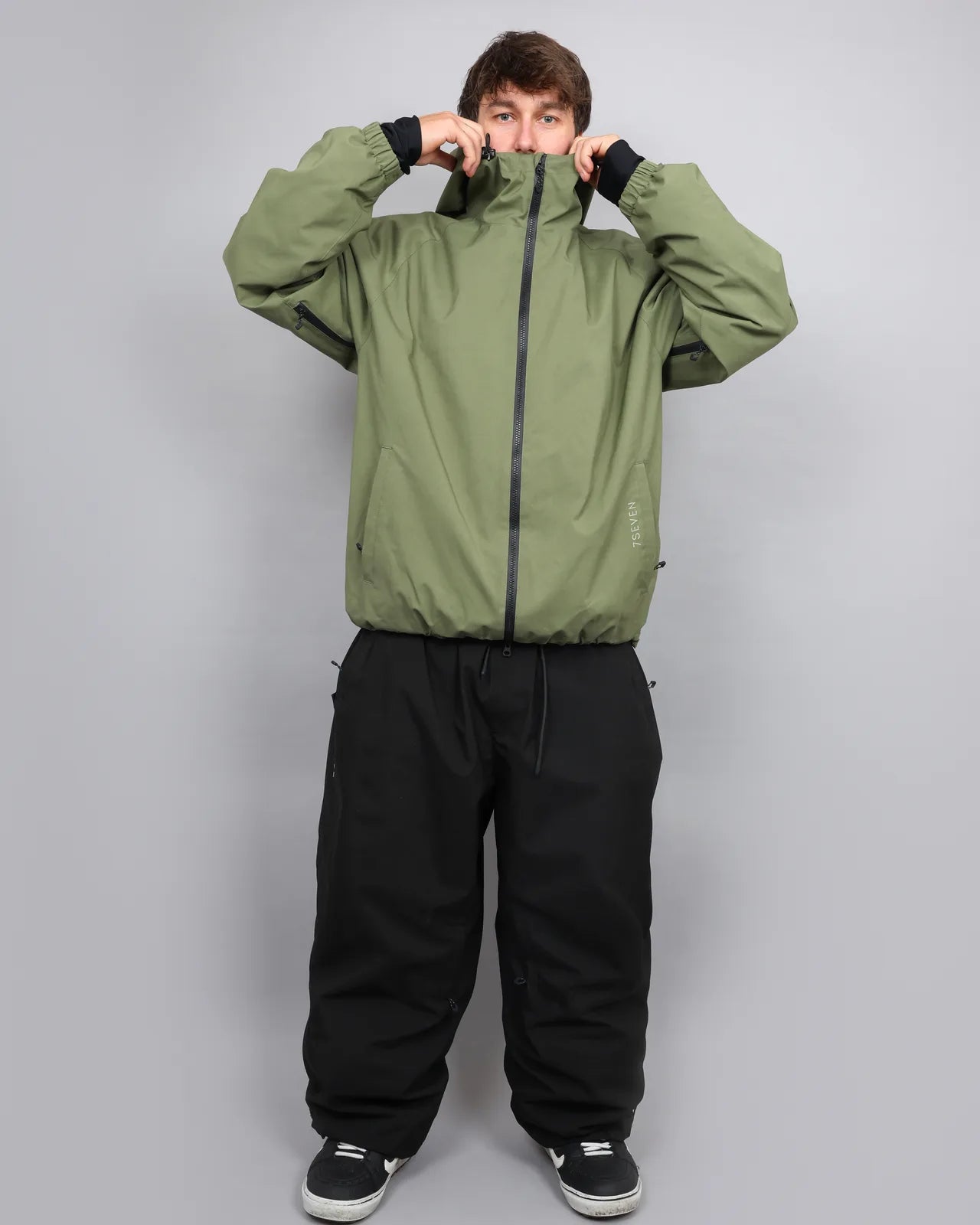 Olive jacket and black pants — 9S9A2454