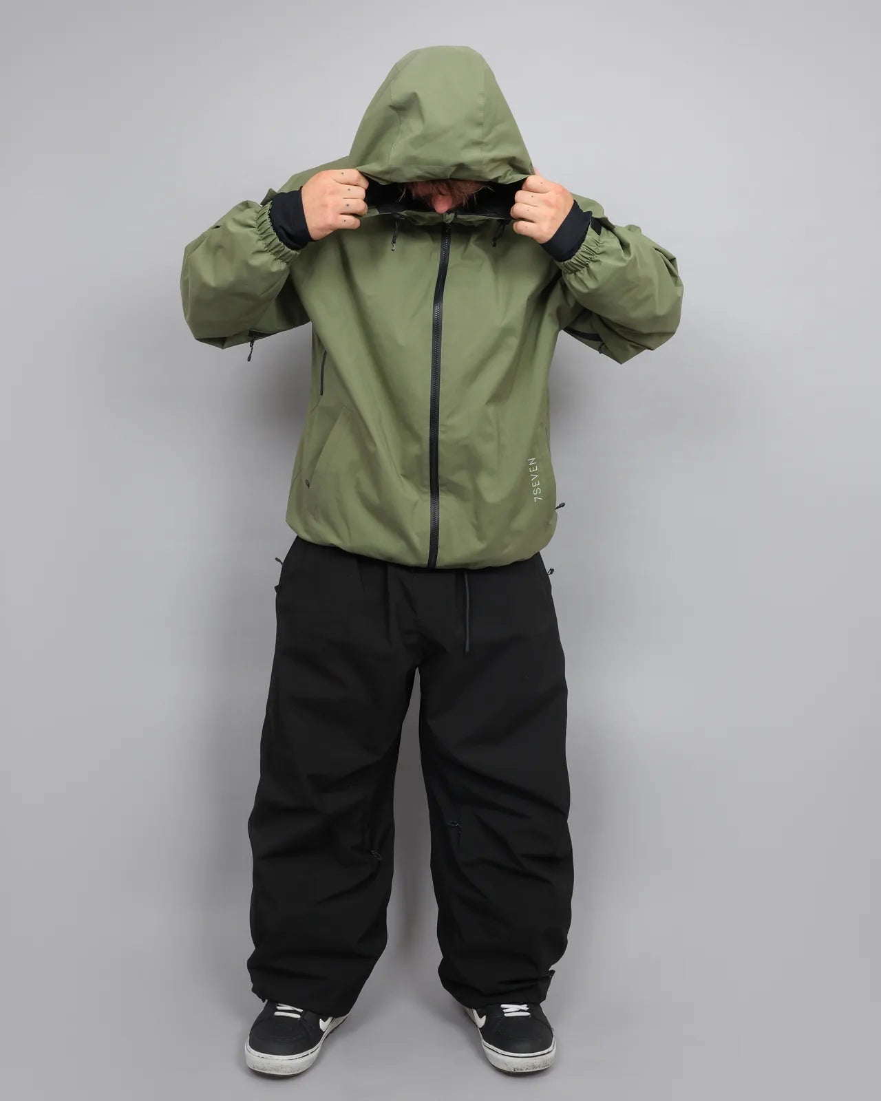 Olive jacket and black pants — 9S9A2455