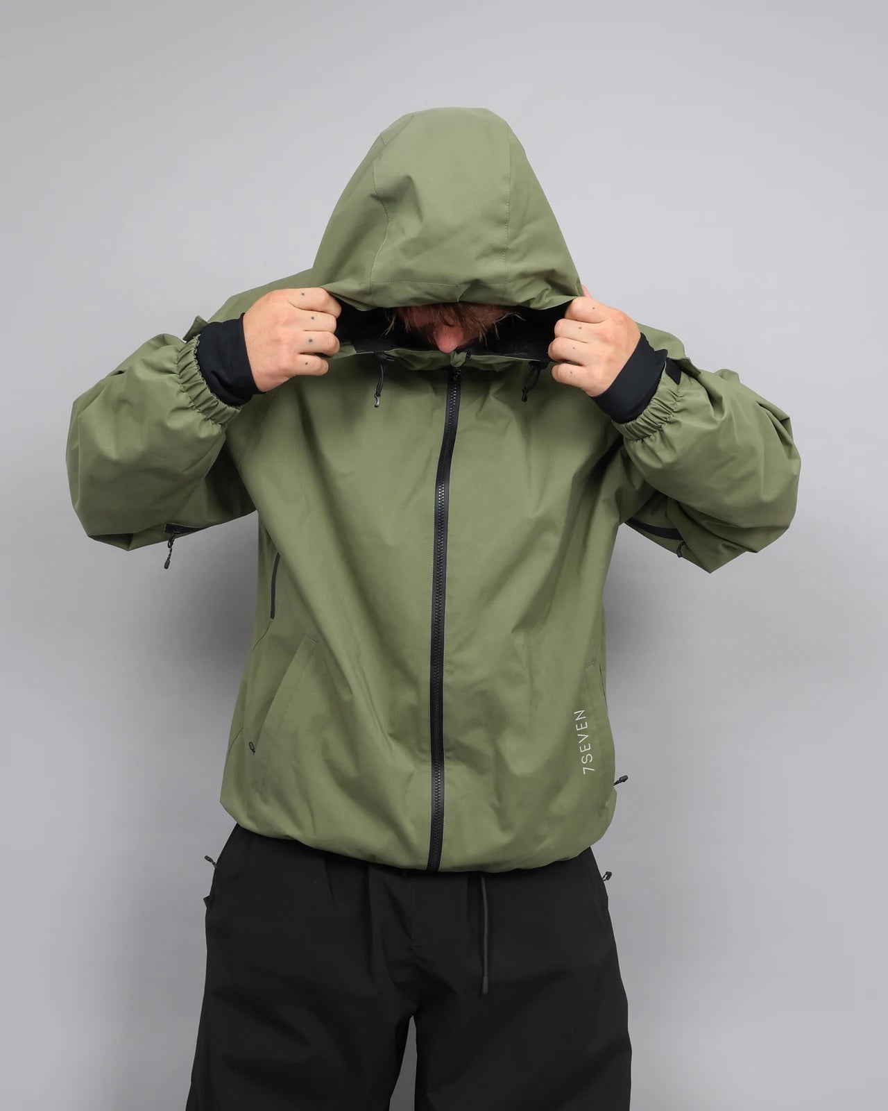 Olive jacket and black pants — 9S9A24551